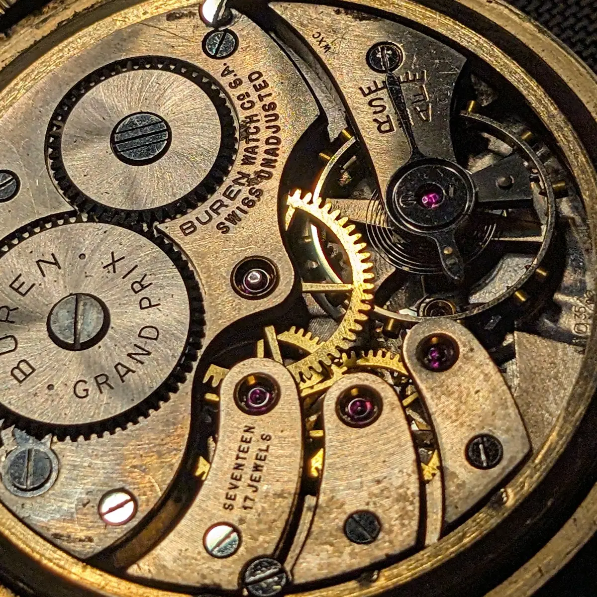 Close-up photograph of a mechanical watch movement